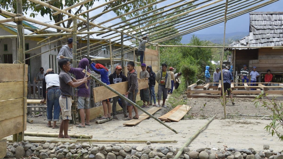 Local community working together on bamboo structure in South Sulawesi, Indonesia.