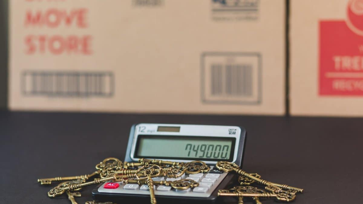 A calculator with vintage keys symbolizes real estate investment and mortgage calculations.