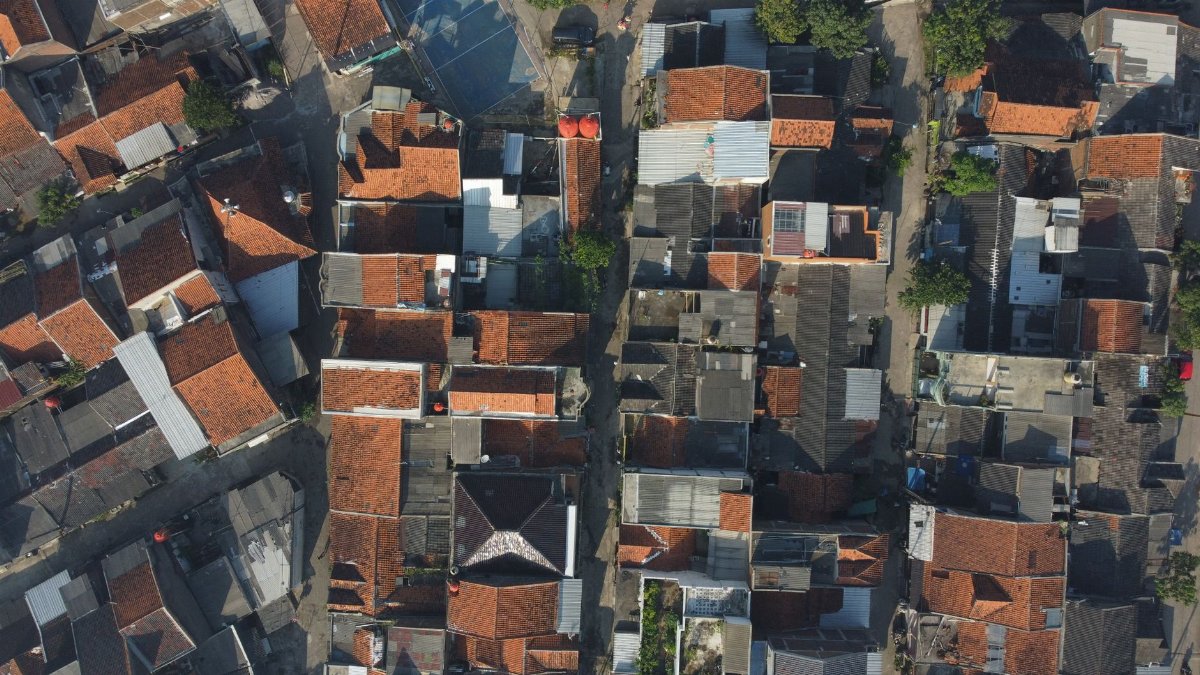 Drone view of residential rooftops in Rancaekek, showcasing urban density and architecture.