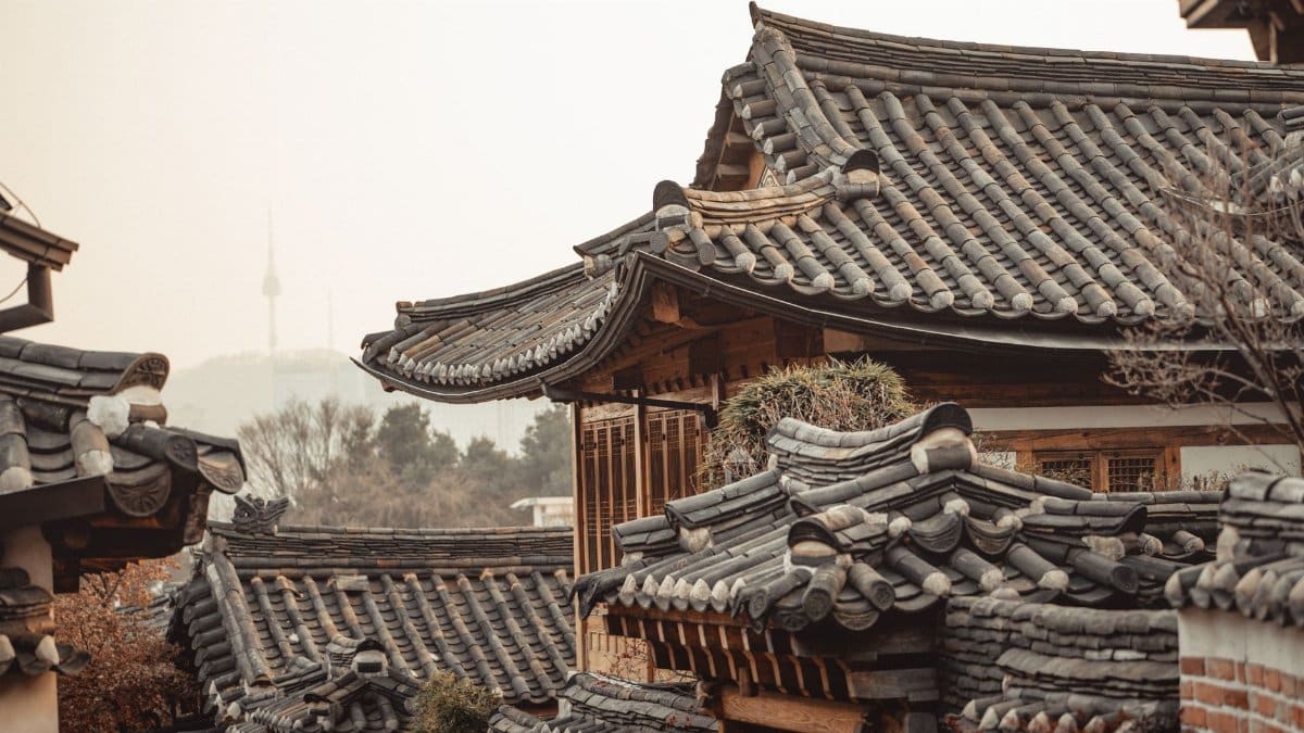 A charming view of traditional Hanok roofs in Seoul's historic Bukchon Hanok Village.