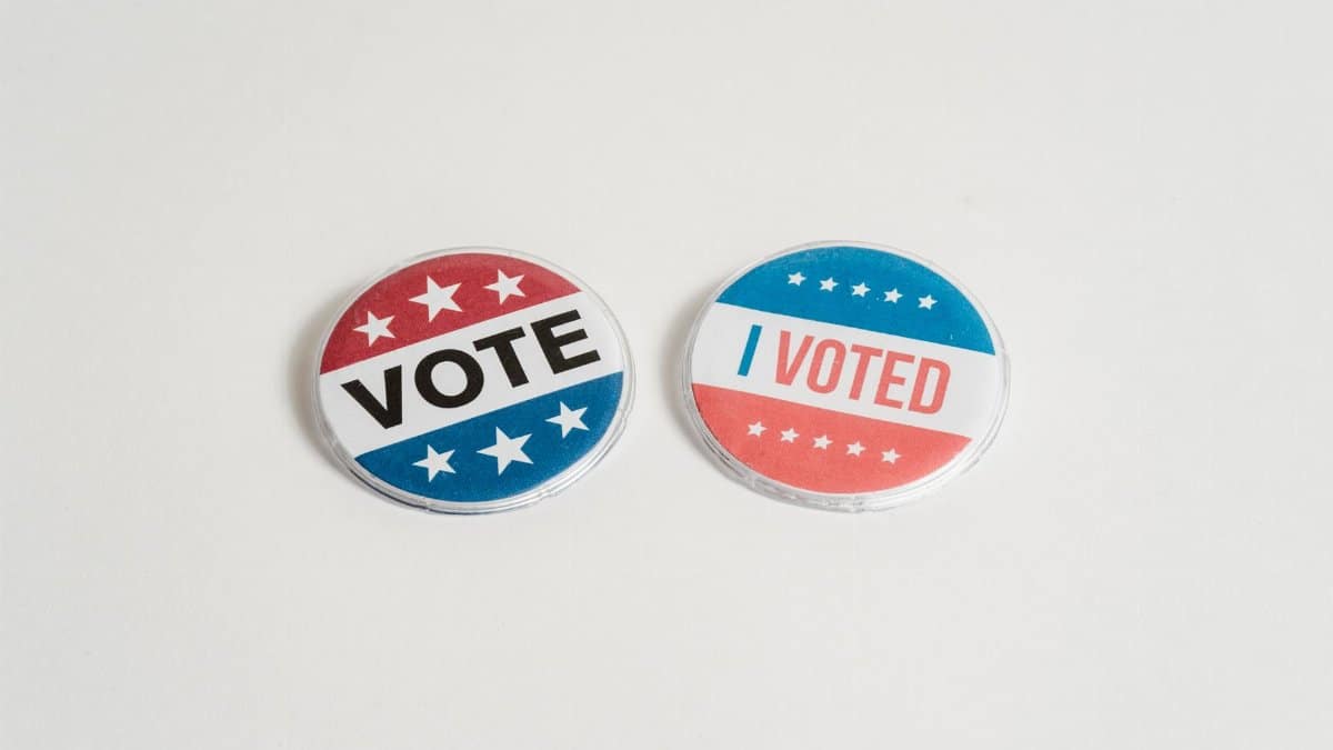 Red, white, and blue political buttons with 'Vote' and 'I Voted' text for election and civic engagement themes.