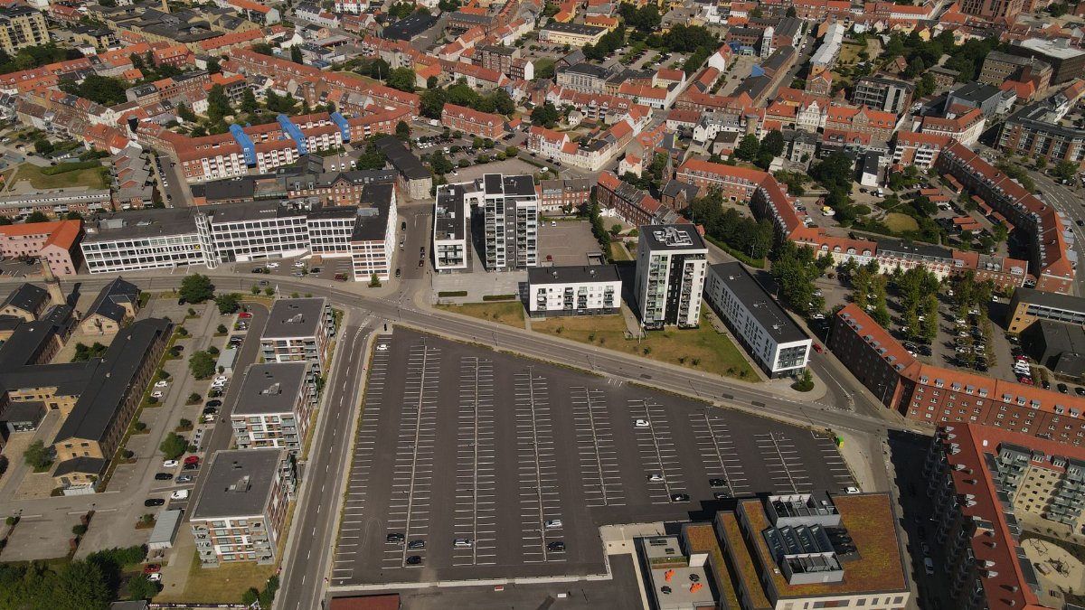 Explore the urban landscape of Horsens, Denmark from above.