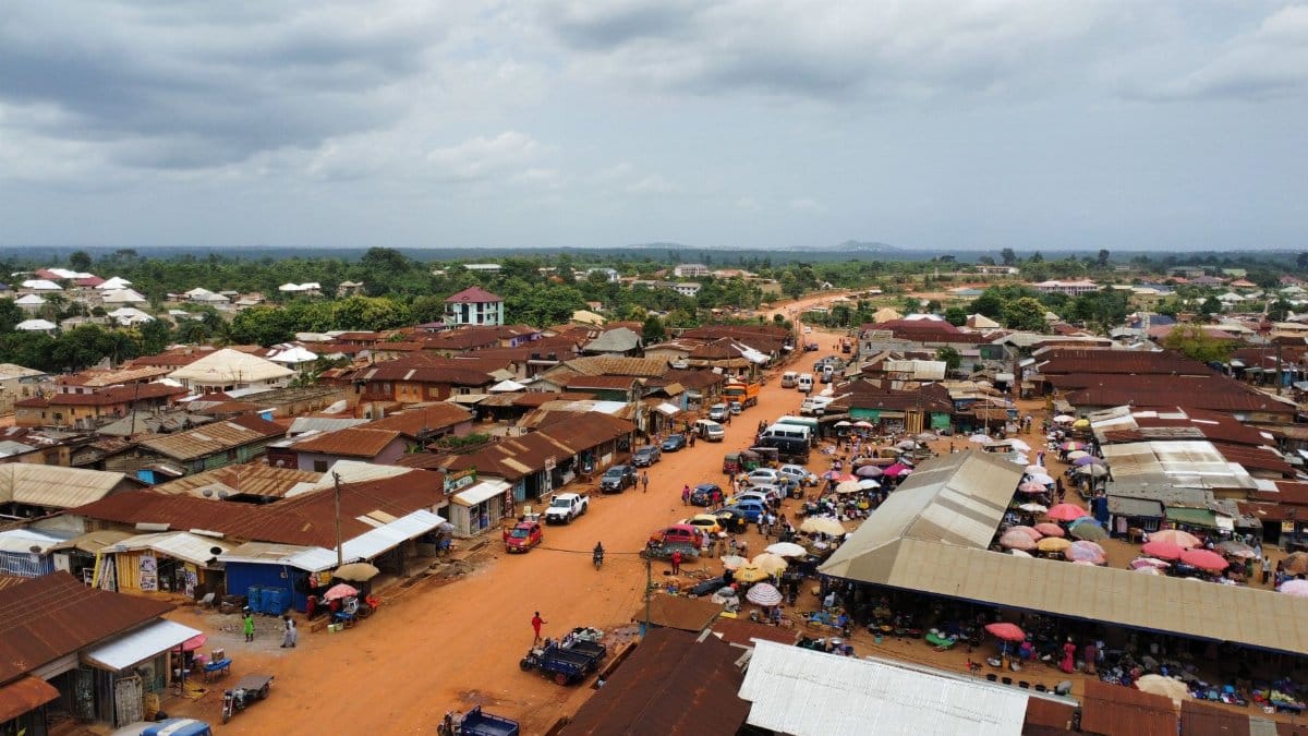 A vibrant aerial shot of a rural marketplace in Africa, showcasing daily life.