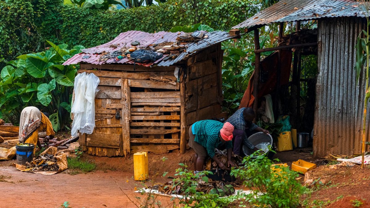 A glimpse into daily village life in rural Africa with people engaged in local activities.