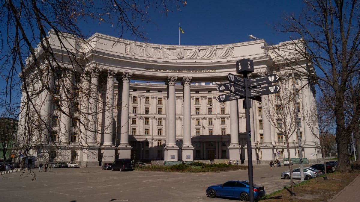 Grand facade of the Ministry of Foreign Affairs in Kyiv, a prime example of architectural elegance under a clear blue sky.