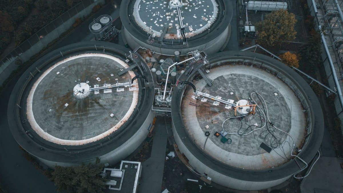 Drone shot of industrial tanks in Seattle highlights technology and engineering landscape.