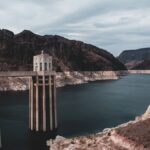 Stunning aerial shot of Hoover Dam and Lake Mead in the United States with dramatic landscape.