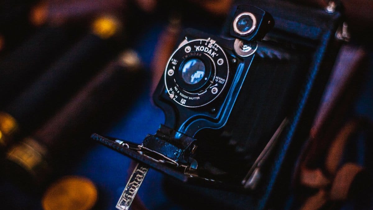 A detailed close-up of a vintage Kodak camera highlighting its classic design and intricate details.