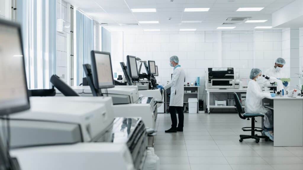 Scientists conducting research in a state-of-the-art laboratory with advanced equipment.