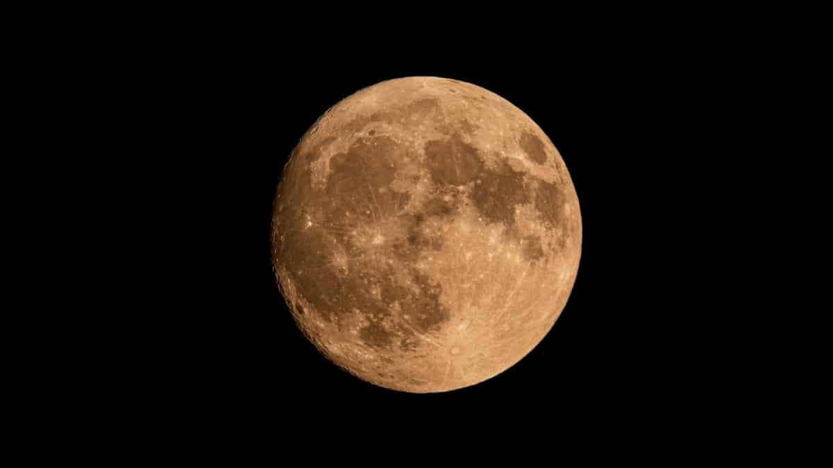 A vivid capture of the full moon glowing brightly in the night sky over Canonsburg.