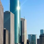 Stunning view of Houston's skyscrapers under clear blue sky.