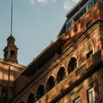 Elegant architectural detail of a historic building in Phoenix, Arizona, with warm sunset lighting.