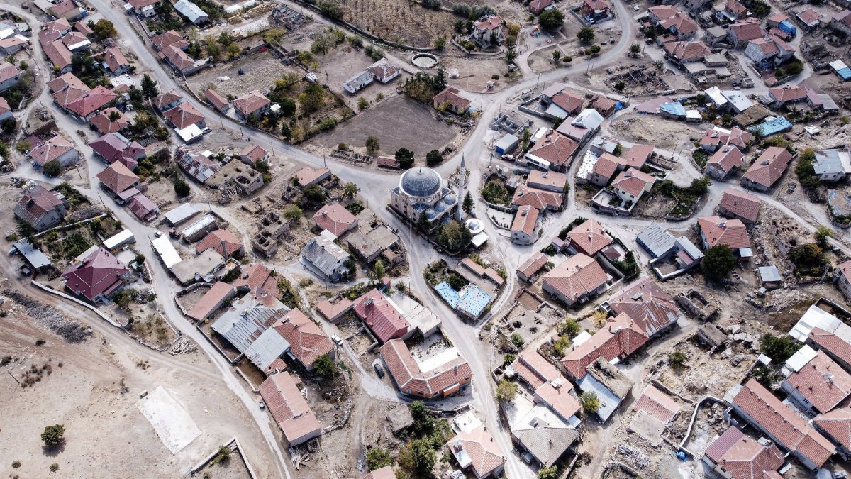 Aerial shot of Güneysınır village, showcasing traditional Turkish architecture and layout.