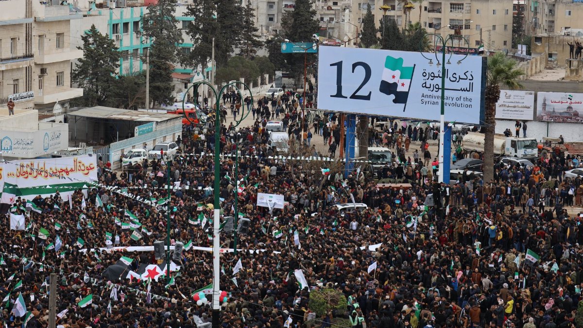 Crowd celebrating the 12th anniversary of the Syrian revolution in Idlib, Syria.