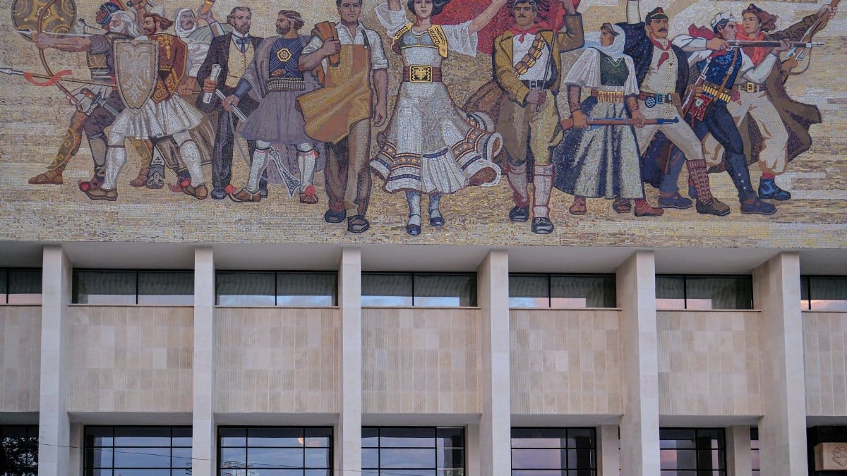 The intricate mosaic facade of the National Historical Museum in Tirana, Albania.