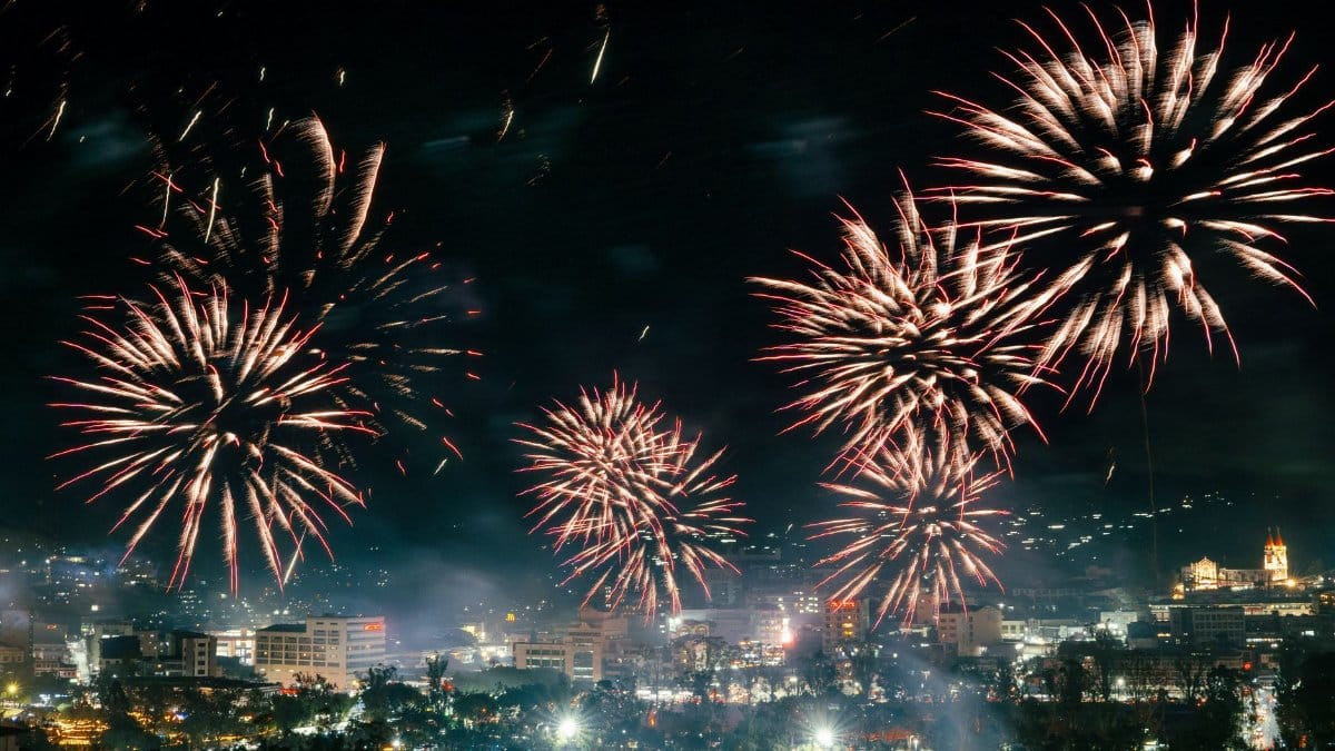 Stunning fireworks light up the night sky over Baguio City, celebrating a festive occasion with vibrant colors.
