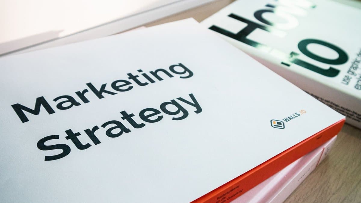 A detailed view of marketing strategy documents with close focus on text, ideal for business and finance content.
