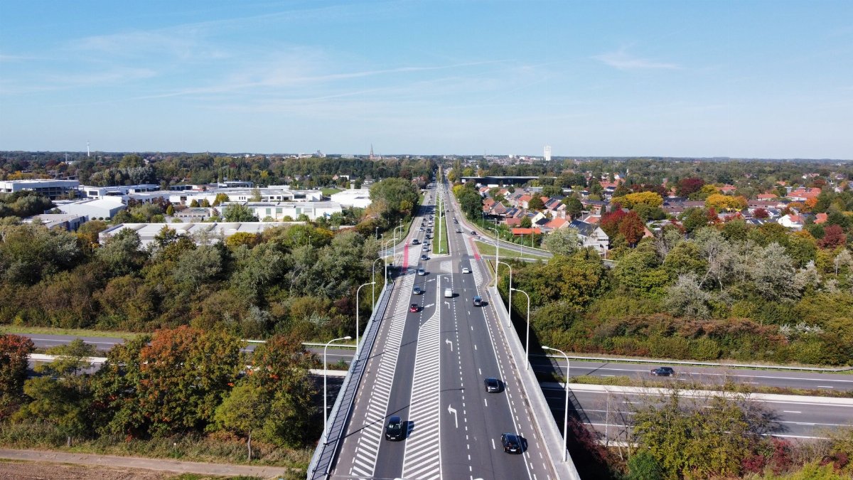 Drone shot capturing a vibrant road and surrounding landscape in Turnhout, Belgium.