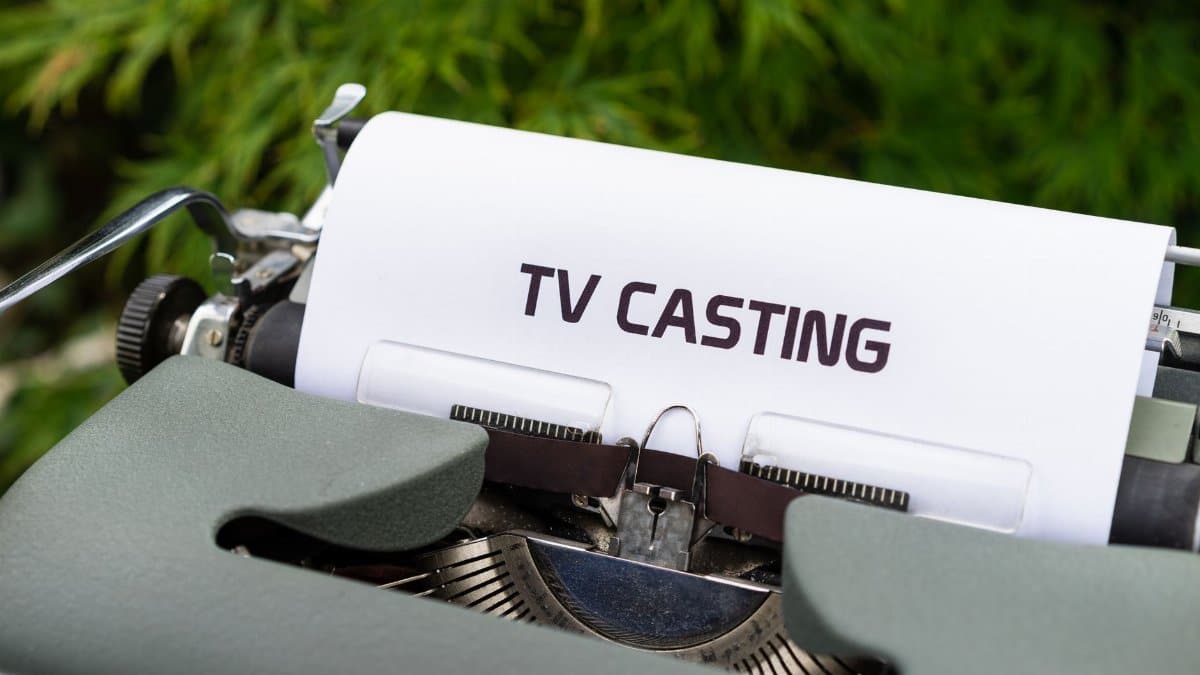 Close-up of a vintage typewriter with a sheet saying 'TV Casting', emphasizing the concept of scriptwriting.