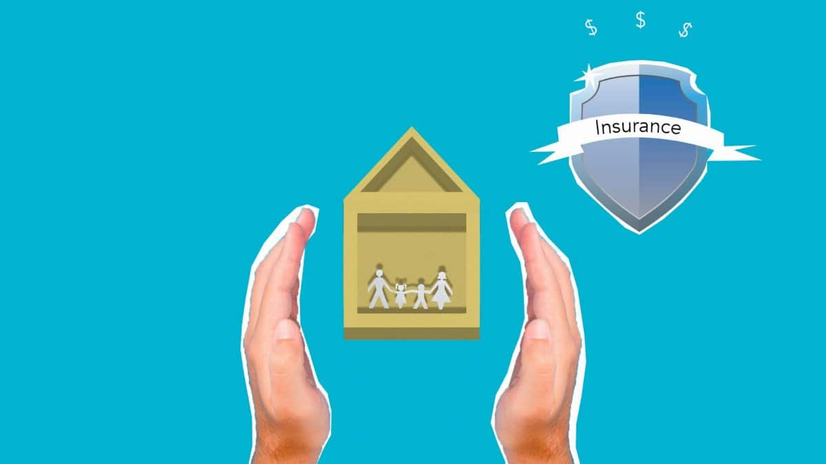 Decorative cardboard illustration of person hands protecting house with human figures near shield with Insurance inscription on blue background