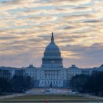 Stunning view of the U.S. Capitol Building during sunrise in Washington DC, highlighting its iconic architecture.