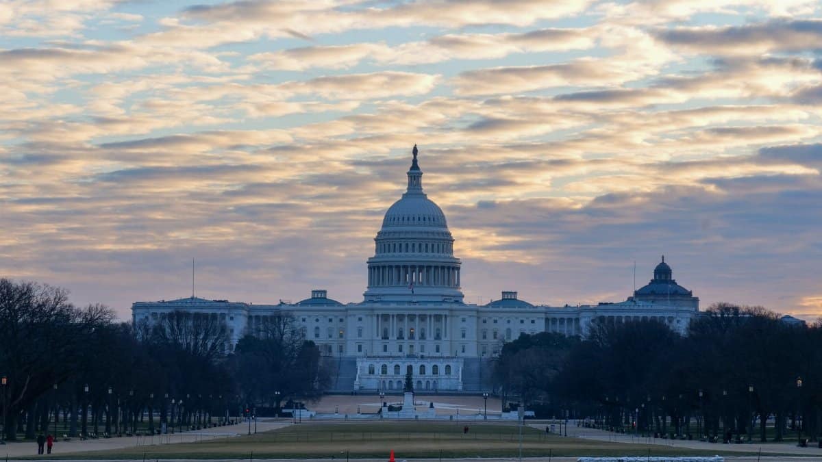 Stunning view of the U.S. Capitol Building during sunrise in Washington DC, highlighting its iconic architecture.