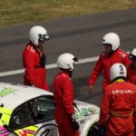 Race crew with driver after a race event in Ciudad de México, Mexico.