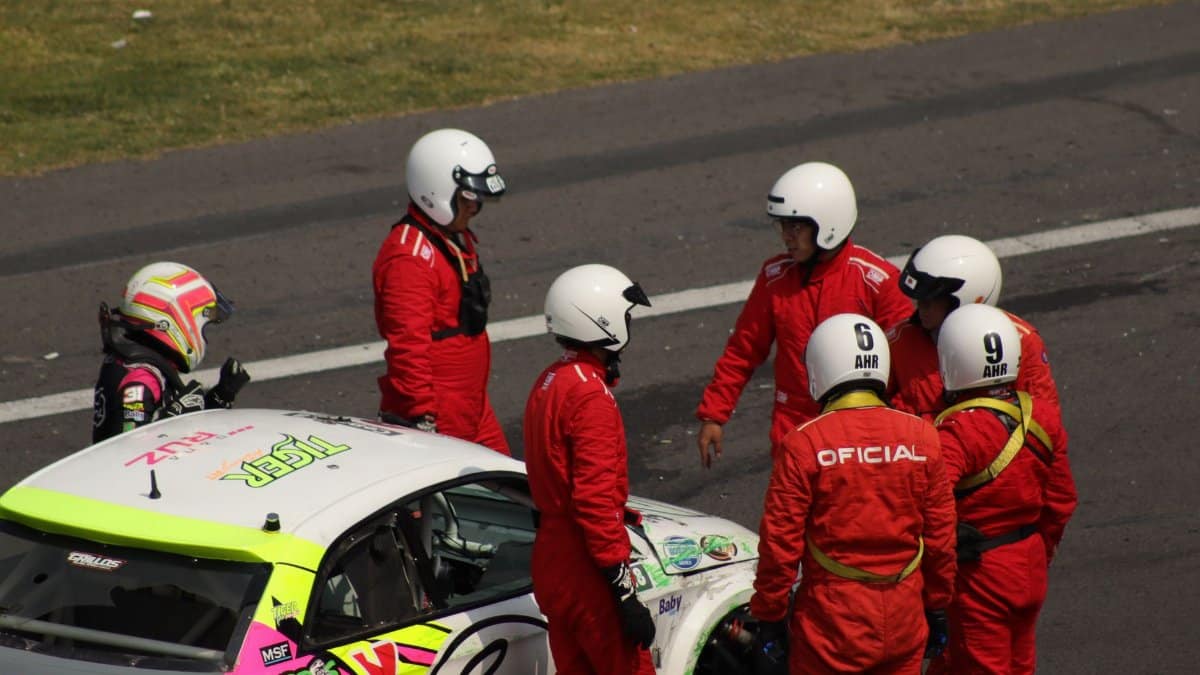 Race crew with driver after a race event in Ciudad de México, Mexico.
