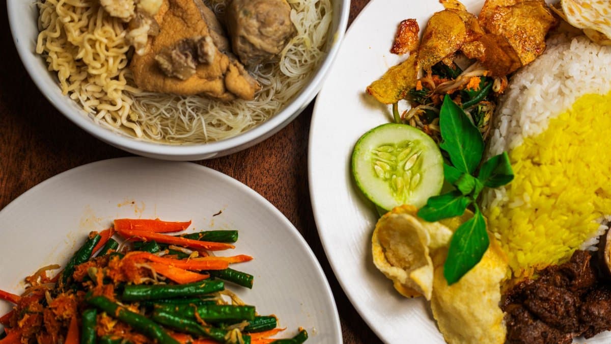A vibrant array of traditional Indonesian dishes showcasing local flavors and ingredients.