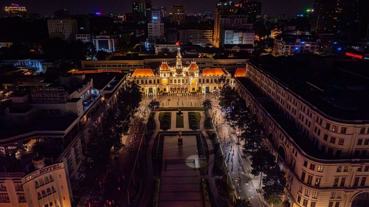 A stunning night aerial view of the Ho Chi Minh City Hall in Vietnam.
