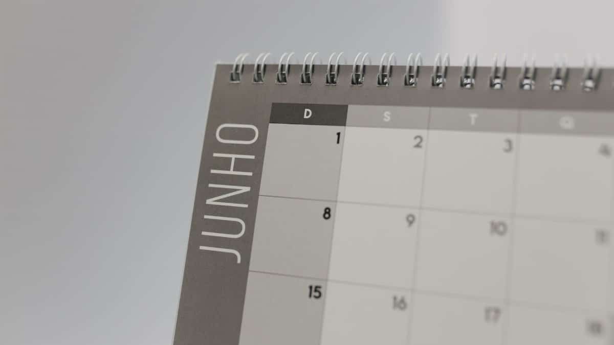 Close-up view of a spiral-bound calendar showing the month of June with a date grid.