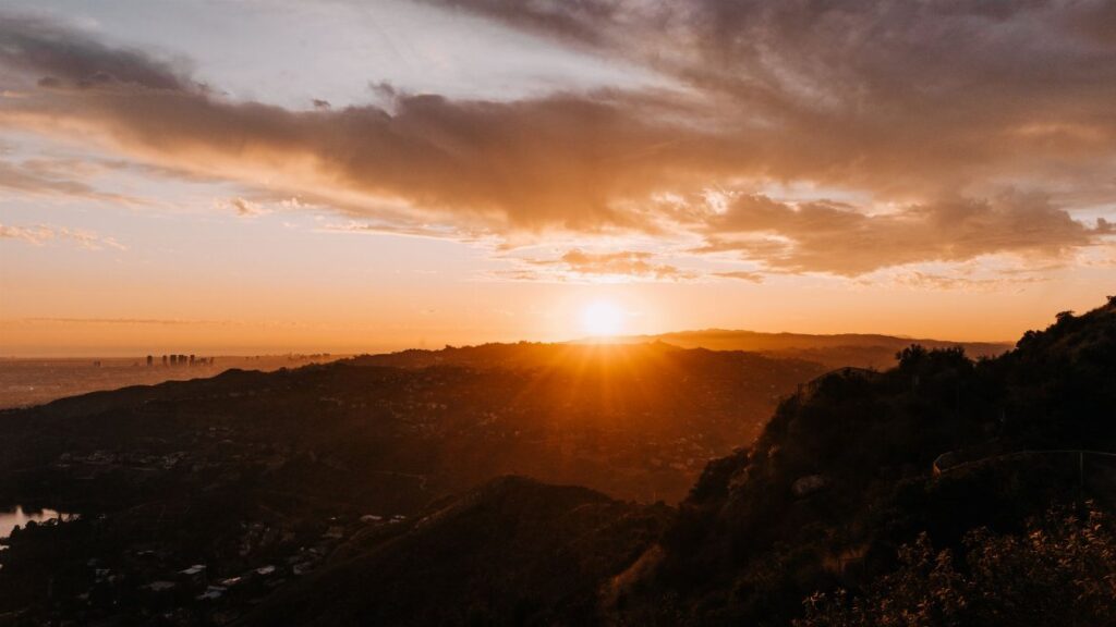 Stunning sunset view over the hills of Los Angeles, capturing golden hour beauty.