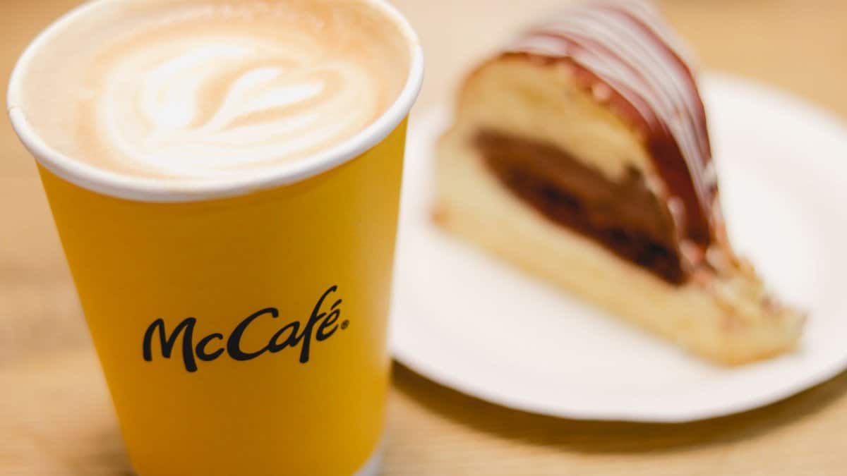 Enjoy a cappuccino and dessert at McCafé in Qatar, perfect for coffee lovers.