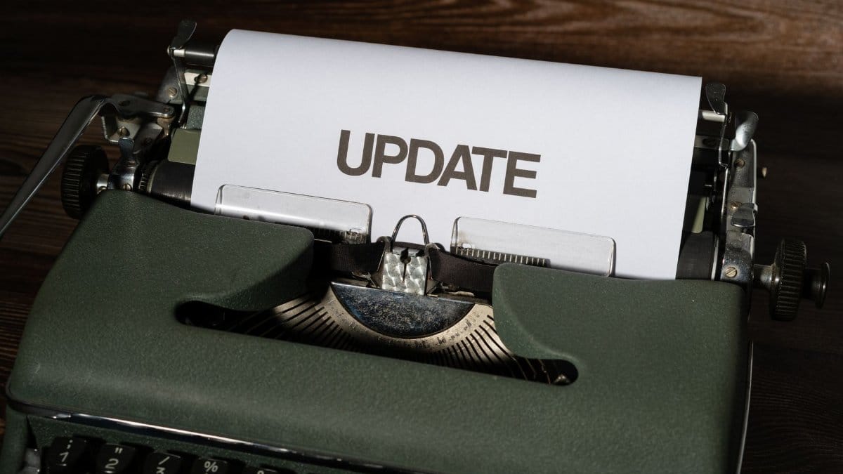 A close-up of a classic typewriter with a sheet displaying 'UPDATE' text, evoking nostalgia.
