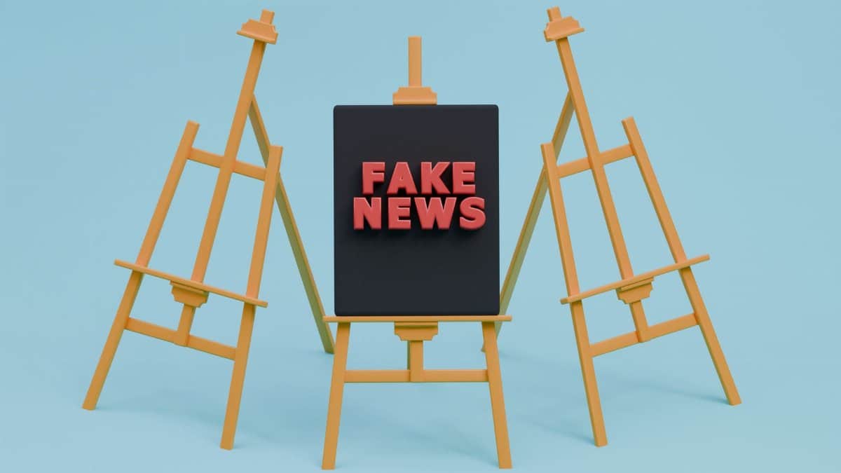 Vibrant easels displaying 'Fake News' text conceptually highlighting media themes.