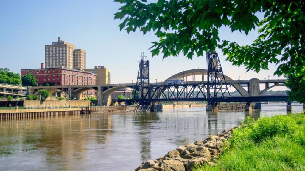 A scenic view of a train bridge over the Mississippi River in Saint Paul, Minnesota.