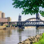 A scenic view of a train bridge over the Mississippi River in Saint Paul, Minnesota.