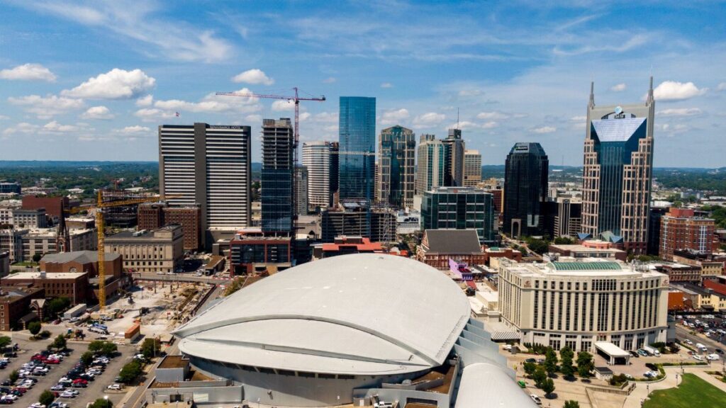 Aerial view of Nashville skyline featuring modern skyscrapers and downtown architecture.
