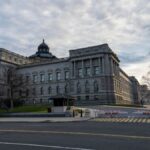 The Library of Congress in Washington D.C. under a dramatic evening sky.