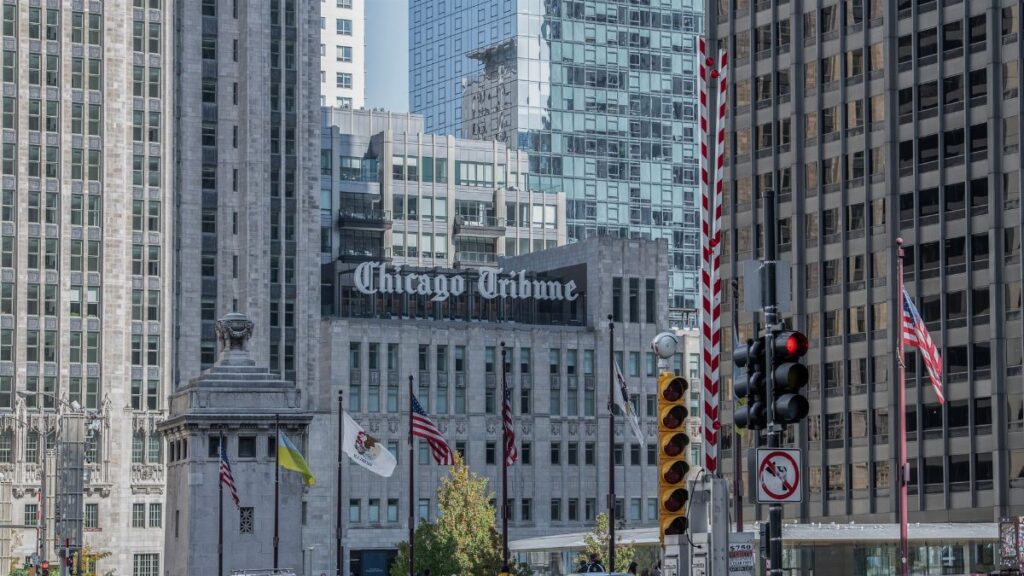 Gothic architecture with cityscape view of the Chicago Tribune building and surrounding skyscrapers in downtown Chicago.