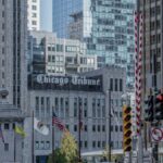 Gothic architecture with cityscape view of the Chicago Tribune building and surrounding skyscrapers in downtown Chicago.