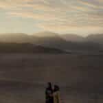 Two women walking at sunset in the majestic Egyptian desert near Sharm El-Sheikh.