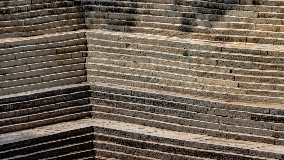 Explore the historical stone steps of Nandi Hills, revealing intricate architectural beauty.