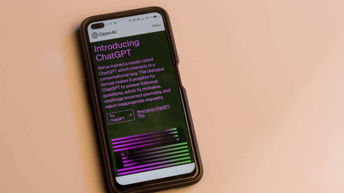 Smartphone screen showing ChatGPT introduction by OpenAI, showcasing AI technology.