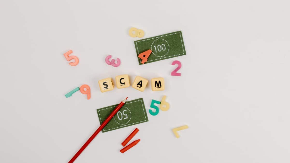 Creative flat lay of scam concept with play money and numbers.