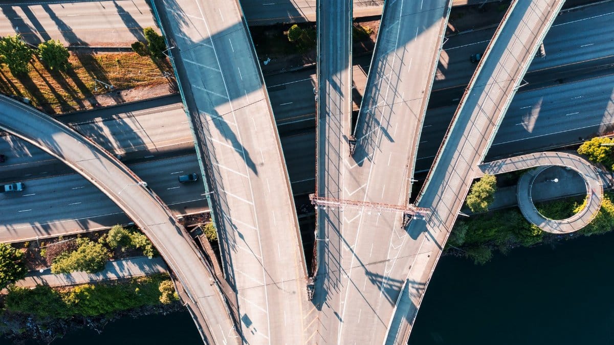 Aerial view of a sprawling highway interchange, showcasing infrastructure and road connections.