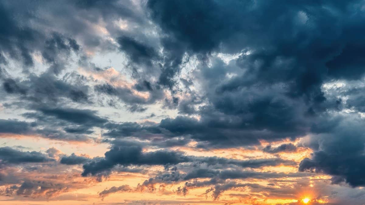 Stunning sunset with dramatic clouds over Kellogg, Minnesota, capturing nature's vivid colors and textures.