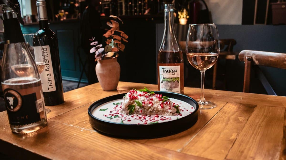 Delightful gourmet dining experience with wine and decor in a stylish restaurant setting.