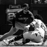 Dynamic black and white photo capturing baseball action in San Francisco.