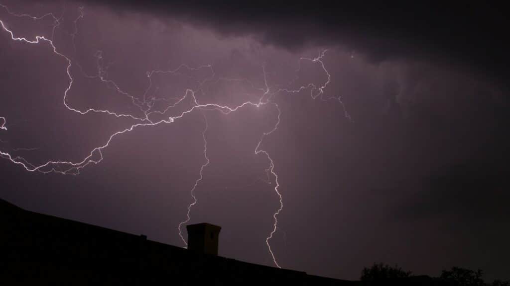 Powerful lightning bolts illuminate the night sky over Cape Town, capturing nature's raw energy.